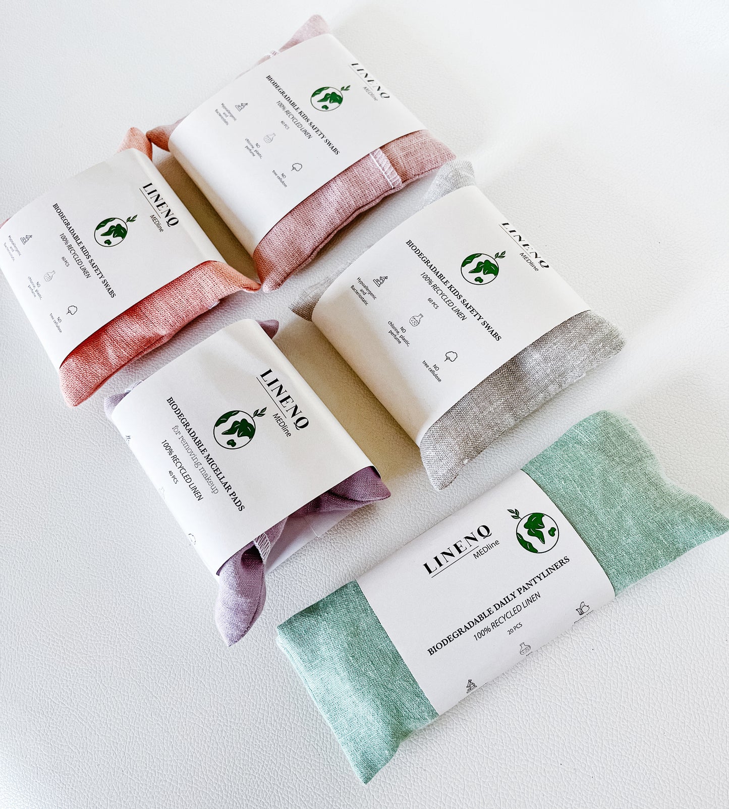 Linen and cotton q-tips with safety stoppers